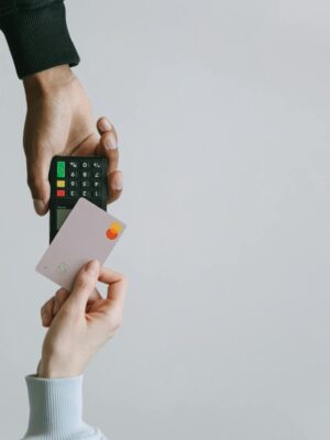 Modern contactless payment using a card and terminal, highlighting the ease of digital transactions.